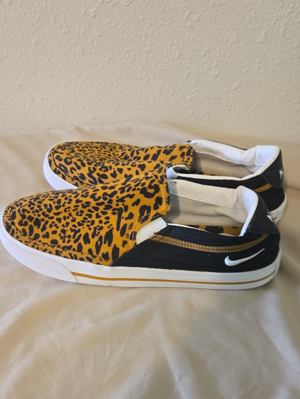 Nike Court Legacy Slip-On Sneakers in Yellow Leopard and Black